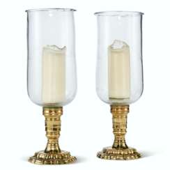 A PAIR OF REGENCE STYLE BRASS PHOTOPHORES