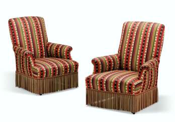 A PAIR OF COLORFULLY STRIPED CLUB CHAIRS