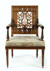 A LATE LOUIS XVI SOLID MAHOGANY FAUTEUIL