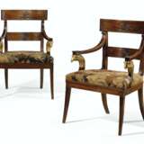 A PAIR OF NORTH EUROPEAN MAHOGANY AND PARCEL-GILT ARMCHAIRS ... - photo 1