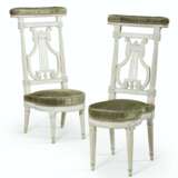 A MATCHED PAIR OF LOUIS XVI WHITE-PAINTED VOYEUSES - фото 1
