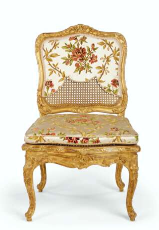 Tilliard, Jean-Baptiste. A LOUIS XV GILTWOOD AND CANED CHAISE - photo 1