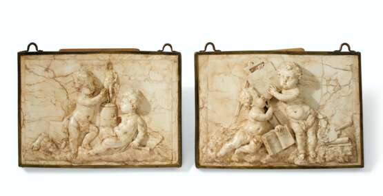 A PAIR OF STONE RELIEFS - photo 1