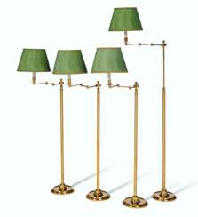 A SET OF FOUR FRENCH BRASS STANDING LAMPS