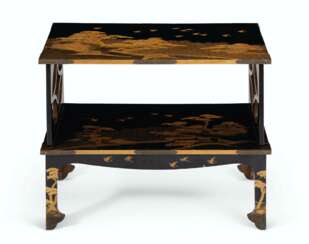 A JAPANESE BLACK AND GILT LACQUER TWO-TIERED LOW TABLE