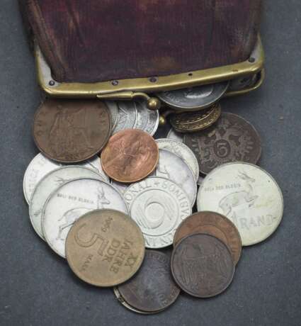 Geldbeutel mit Münzen. - Foto 1