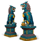 A PAIR OF LARGE CHINESE POLYCHROME-ENAMELLED CERAMIC BUDDHIST LIONS - photo 1