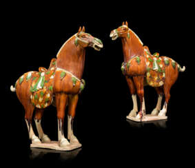 A PAIR OF CHINESE GLAZED POTTERY HORSES