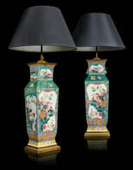 A PAIR OF CHINESE FAMILLE ROSE VASES, MOUNTED AS LAMPS