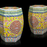 A PAIR OF CHINESE YELLOW-GROUND FAMILLE ROSE HEXAGONAL GARDEN SEATS - photo 1