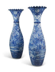 A LARGE PAIR OF JAPANESE BLUE AND WHITE FLARED VASES
