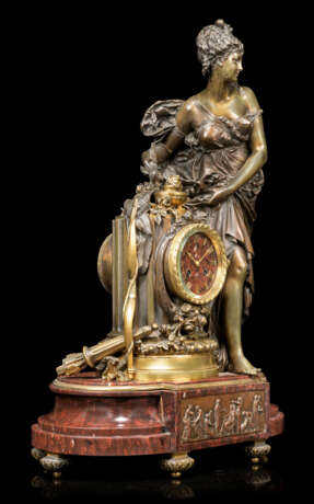 A FRENCH ORMOLU AND PATINATED-BRONZE MOUNTED FIGURAL MANTEL CLOCK - фото 2
