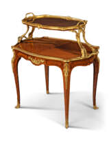 A FRENCH ORMOLU-MOUNTED TULIPWOOD TEA TABLE