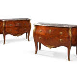 A PAIR OF FRENCH ORMOLU-MOUNTED MAHOGANY AND BOIS SATINE MARQUETRY CHEST-OF-DRAWERS - photo 1