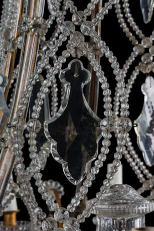 A GILT-METAL CUT, MOULDED AND BEADED-GLASS TWELVE-LIGHT CHANDLIER - photo 6