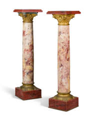 A PAIR OF FRENCH ORMOLU-MOUNTED PINK MARBLE PEDESTALS