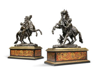 A PAIR OF FRENCH BRONZE 'MARLY' HORSE GROUPS, ON CUT-BRASS AND TORTOISESHELL-INLAID 'BOULLE' BASES