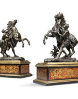 A PAIR OF FRENCH BRONZE 'MARLY' HORSE GROUPS, ON CUT-BRASS AND TORTOISESHELL-INLAID 'BOULLE' BASES