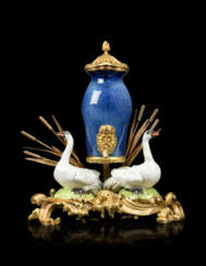 A FRENCH ORMOLU-MOUNTED PORCELAIN CENTREPIECE