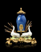 A FRENCH ORMOLU-MOUNTED PORCELAIN CENTREPIECE