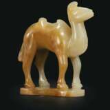 A VERY RARE PALE BEIGISH-WHITE AND YELLOWISH-BROWN JADE MINIATURE FIGURE OF A STANDING BACTRIAN CAMEL - фото 1