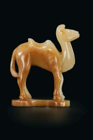 A VERY RARE PALE BEIGISH-WHITE AND YELLOWISH-BROWN JADE MINIATURE FIGURE OF A STANDING BACTRIAN CAMEL - photo 2