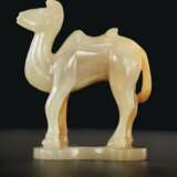 A VERY RARE PALE BEIGISH-WHITE AND YELLOWISH-BROWN JADE MINIATURE FIGURE OF A STANDING BACTRIAN CAMEL - photo 3