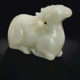 A LARGE WHITE JADE FIGURE OF A RECUMBENT STAG - photo 2