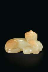 A PALE YELLOW AND PALE RUSSET JADE ANIMAL GROUP