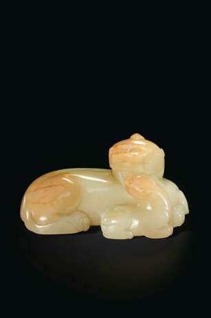A PALE YELLOW AND PALE RUSSET JADE ANIMAL GROUP - photo 1