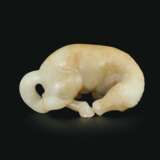A WHITE AND PALE BROWN JADE FIGURE OF A ROLLING HORSE - photo 2