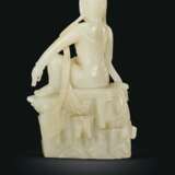 A WHITE JADE FIGURE OF THE `WATER MOON` GUANYIN - photo 2