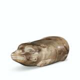 A LARGE YELLOWISH-BROWN AND OPAQUE BUFF JADE FIGURE OF A RECUMBENT TIGER - фото 1