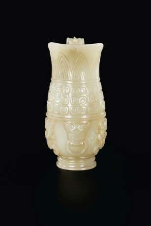 A SMALL ARCHAISTIC PALE GREYISH-GREEN JADE POURING VESSEL - photo 3