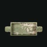 AN UNUSUAL ARCHAISTIC OLIVE-GREEN JADE RECTANGULAR VESSEL WITH HANDLES - photo 3