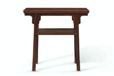 A SMALL HUANGHUALI RECESSED-LEG SIDE TABLE