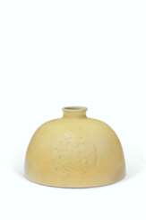 A VERY RARE YELLOW-GLAZED RELIEF-DECORATED WATER POT, TAIBAI ZUN