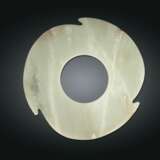 A RARE PALE GREEN JADE NOTCHED DISC - photo 1