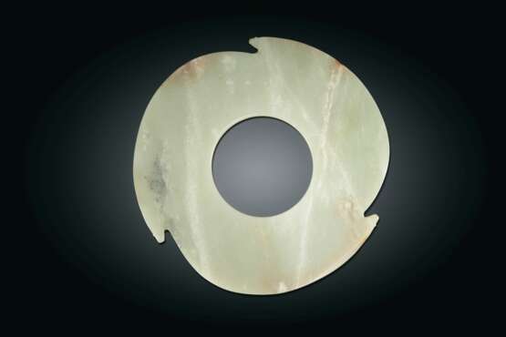 A RARE PALE GREEN JADE NOTCHED DISC - photo 1