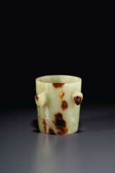 A RARE YELLOW AND BROWN JADE TAPERING TUBULAR ORNAMENT