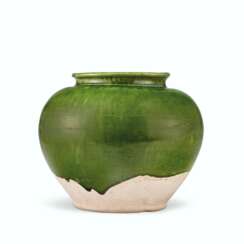 A GREEN-GLAZED POTTERY JAR