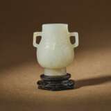 A LAPIS LAZULI VASE AND COVER AND A CARVED WHITE JADE HU-FORM VASE - фото 2