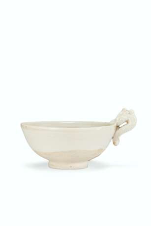 A SMALL WHITE-GLAZED DRAGON-HANDLED CUP - photo 1