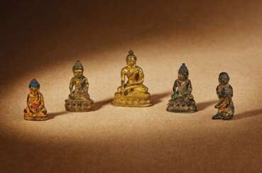 A GROUP OF FIVE MINIATURE BUDDHIST FIGURES