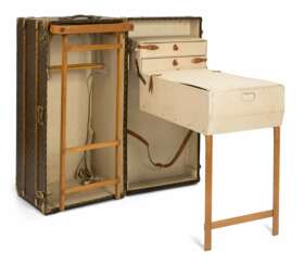 Sold at Auction: Grande malle armoire Louis Vuitton avec tiroirs secrets