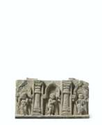 Basrelief. A GREEN SCHIST RELIEF WITH DEVOTEES IN NICHES