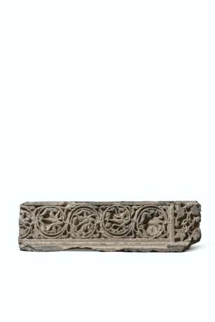A GRAY SCHIST RELIEF WITH FOLIATE SCROLL - фото 1