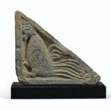 A GRAY SCHIST STAIR-RISER RELIEF OF A MYTHICAL BEAST - фото 1