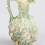 A Roman green glass mold-blown flask - photo 2
