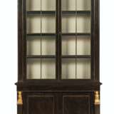 A PAIR OF GEORGE IV FAUX ROSEWOOD-GRAINED, PARCEL-GILT AND BRASS-MOUNTED LIBRARY CABINETS - photo 1